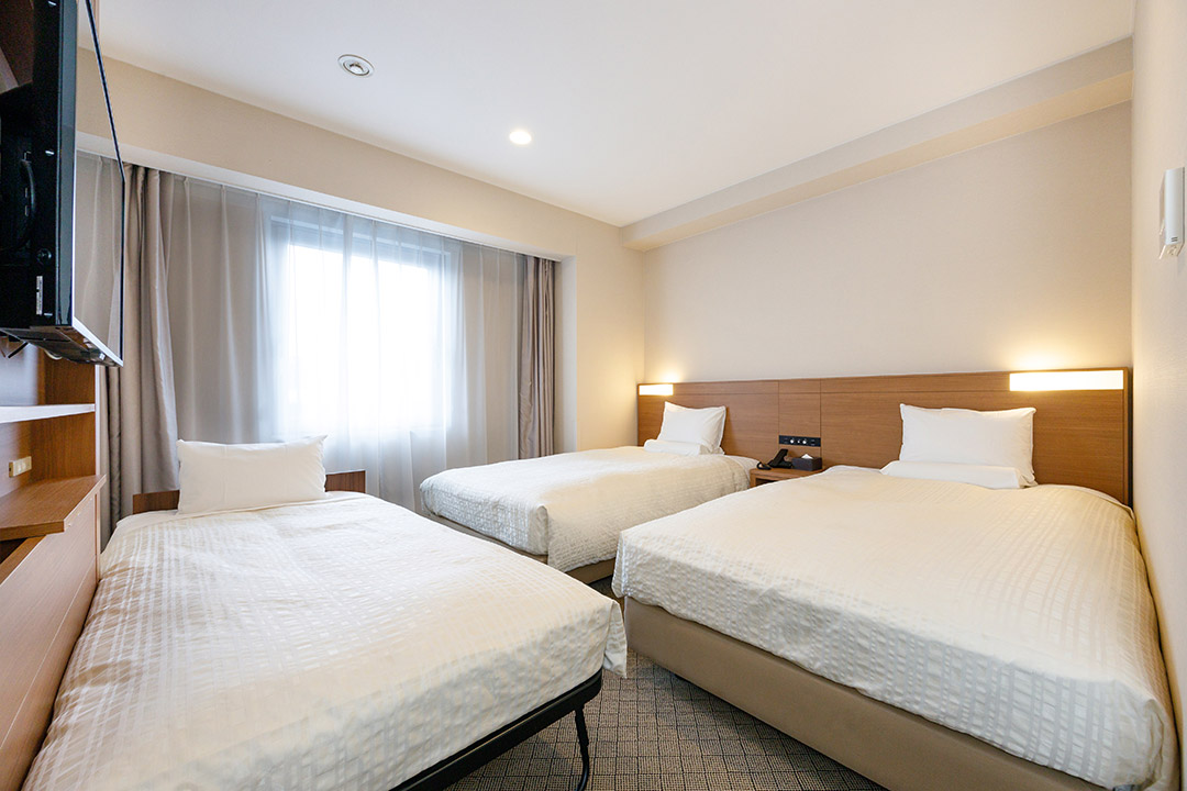 Twin beds + extra bed (for 3 persons)