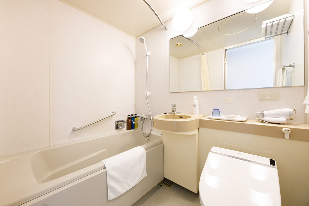 Twin beds + extra bed (for 3 persons)