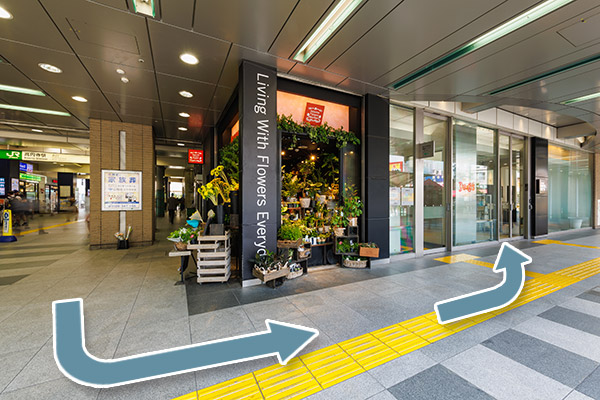 There is a hotel sign at the entrance.